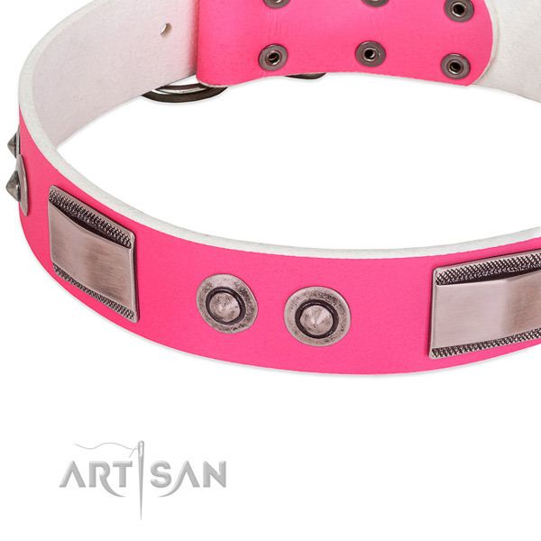 Elegant pink dog collar with large plates and spiked
studs