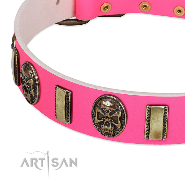 Elegant pink leather dog collar with riveted
decorations
