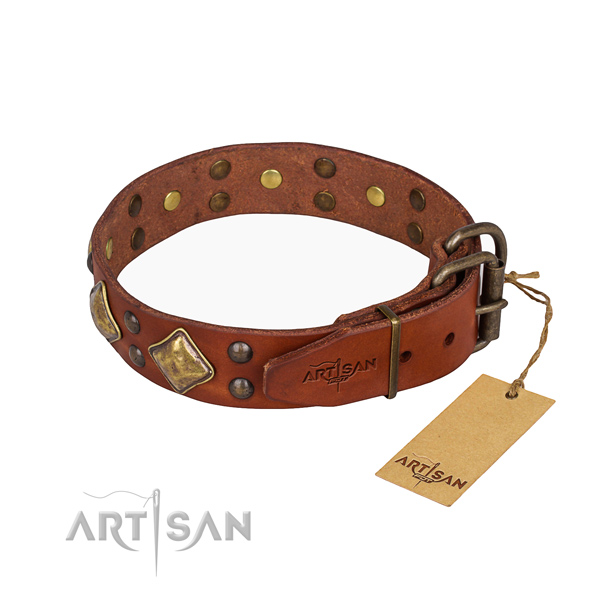 Tan leather dog collar with durable buckle and D-ring