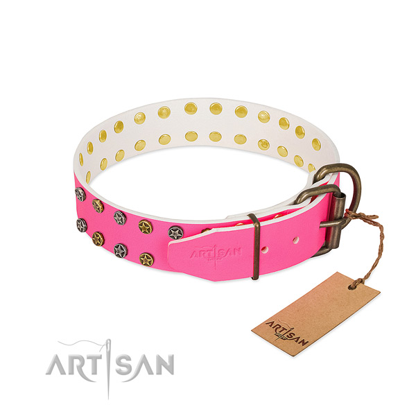 Studded leather dog collar with old bronze-like plated
fittings
