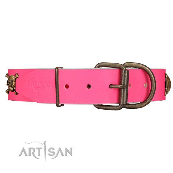 Durable pink leather dog collar with old bronze-like
hardware